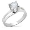 A silver engagement ring with a round, clear diamond set in a four-prong mounting.