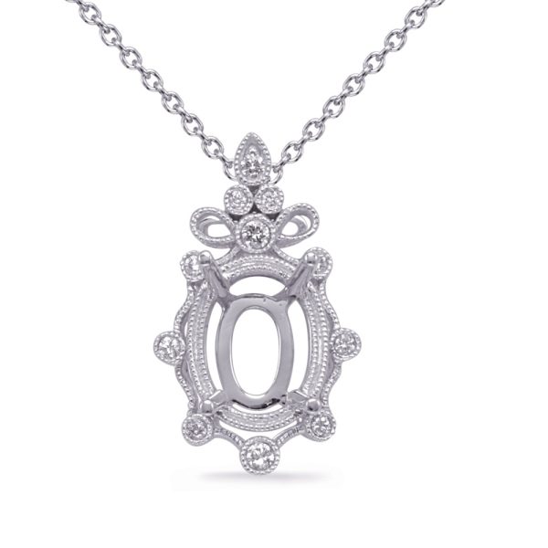 A silver necklace features an ornate pendant with a central oval opening and decorative details, including small gemstones.