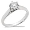 A silver engagement ring with a round, transparent diamond set in a six-prong mount.