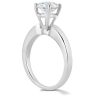 A silver engagement ring with a prominent round diamond is displayed against a white background.