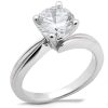 A silver engagement ring features a large, round, clear diamond set in a four-prong mounting.