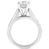 A silver ring with a prominent diamond at the top is displayed against a plain background.