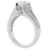 A silver ring with a large central diamond and smaller accent stones on the band is displayed from the side.