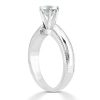 A silver engagement ring with a prominent diamond centerpiece is displayed against a plain background.