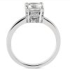 A silver engagement ring features a prominent square-cut diamond set above a row of smaller stones.