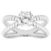 A silver engagement ring features a round diamond set in a twisted band design.