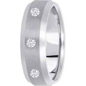 A silver band ring with a brushed finish featuring three evenly spaced clear gemstones.