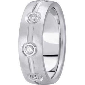 A silver ring with a brushed finish features three clear, circular diamonds evenly spaced along its band.