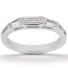 A silver band ring features three rectangular, clear gemstones set in a row at the top.