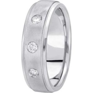 A silver wedding band features three embedded round diamonds set evenly along the brushed surface.