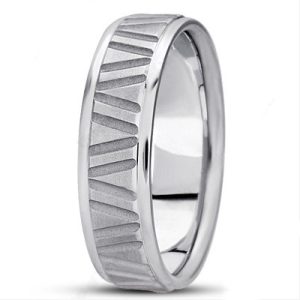 A silver ring with a textured design featuring angled grooves around its surface.