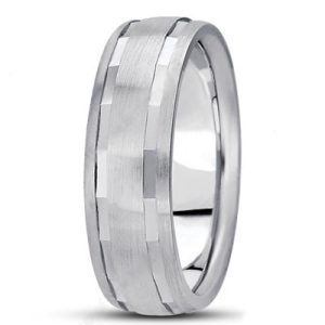 A silver wedding band with a brushed and polished finish featuring a geometric pattern.