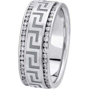 Silver ring featuring a geometric pattern and embedded stones.