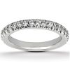 A silver ring is displayed with multiple small diamonds set along its band.