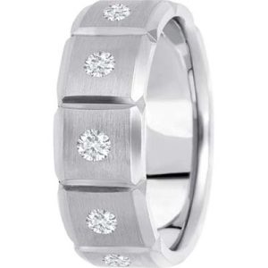 A silver ring features a brushed finish with four evenly spaced embedded diamonds.