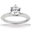A silver ring with a round, clear diamond set in a six-prong setting.