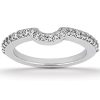 A silver ring with a curved design is adorned with small clear crystals along its band.