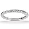 A silver band ring set with small clear gemstones encircles the center.
