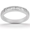 A silver band ring featuring a line of five rectangular-cut gemstones set along the top.