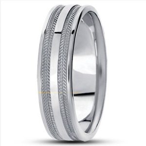 A silver wedding band with a textured design and smooth edges.