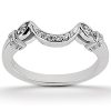 A silver ring with a curved design features three small clear gemstones set along the top.