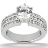 A silver ring features a large central diamond surrounded by smaller accent diamonds along the band.