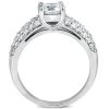 A silver engagement ring features a large central clear gemstone, flanked by smaller diamonds along the band.