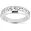 A silver band ring adorned with a line of round, clear gemstones.