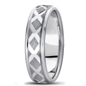 A silver ring features a geometric design with diamond patterns etched around its surface.