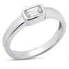 A silver ring with a rectangular diamond is displayed prominently.