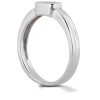 A silver ring with a square bezel sits upright on a surface.