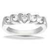 A silver ring features five circular diamonds set in a row.