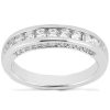 A silver ring featuring a row of small round diamonds along its band.