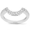 Silver ring with a curved band featuring a row of small, shiny gemstones along the top edge.