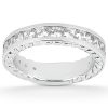 A silver band ring with a row of clear gemstones set around the top edge.
