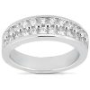 A silver ring featuring a row of small round diamonds along the front.