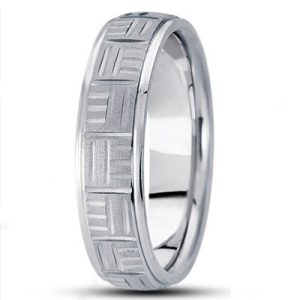 A silver band ring features a textured geometric design around its surface.
