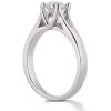 A silver engagement ring with a prominent diamond set in a prong setting.