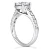 A silver engagement ring featuring a large round diamond at the center and smaller diamonds set along the band.