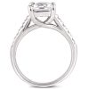 A silver engagement ring featuring a large, rectangular clear gemstone at the center.