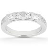 A white gold ring with five princess-cut clear gemstones set in a row.