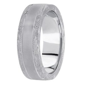 A metal ring with a brushed finish and decorative edge patterns is displayed against a white background.