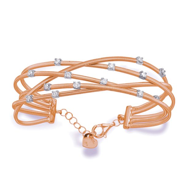 A rose gold bracelet adorned with small diamond-like stones is displayed with a clasp and chain.