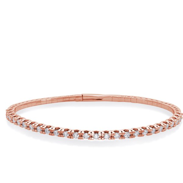 A rose gold bracelet featuring a series of sparkling stones set in a flexible band.