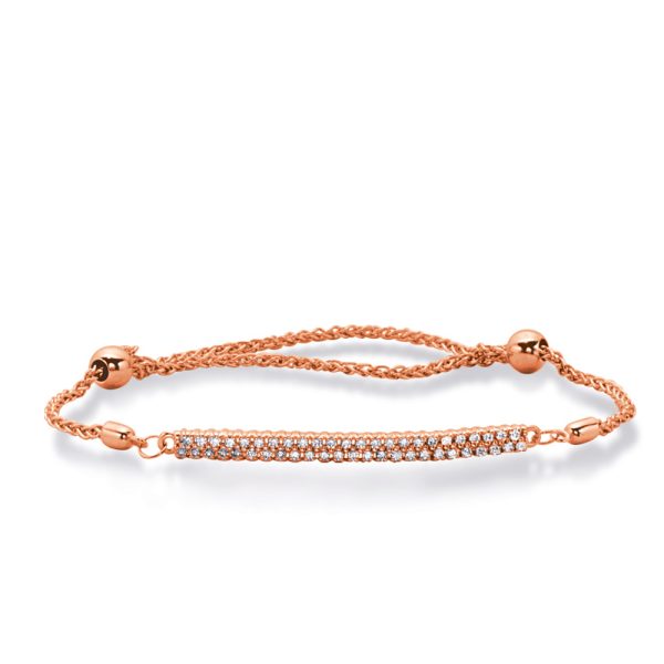A rose gold bracelet with a diamond-encrusted centerpiece is displayed on a white background.