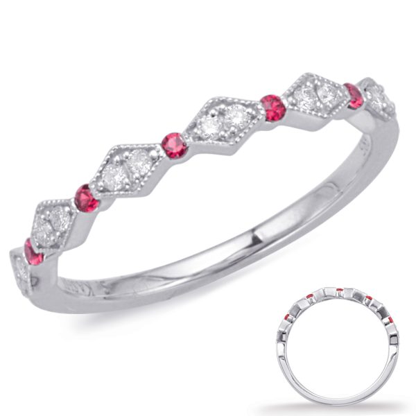 A silver ring featuring alternating red and white gemstones in a diamond pattern.
