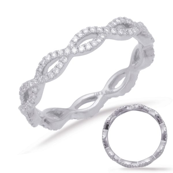 A silver ring with intertwining designs and small embedded gemstones is displayed beside a close-up view of the same ring.