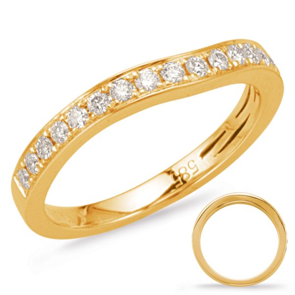 A gold ring featuring a row of sparkling diamonds is displayed alongside a plain gold band.
