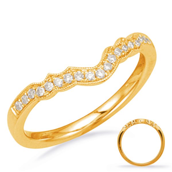 A gold ring with a wavy design is adorned with small, sparkling diamonds along the top edge.