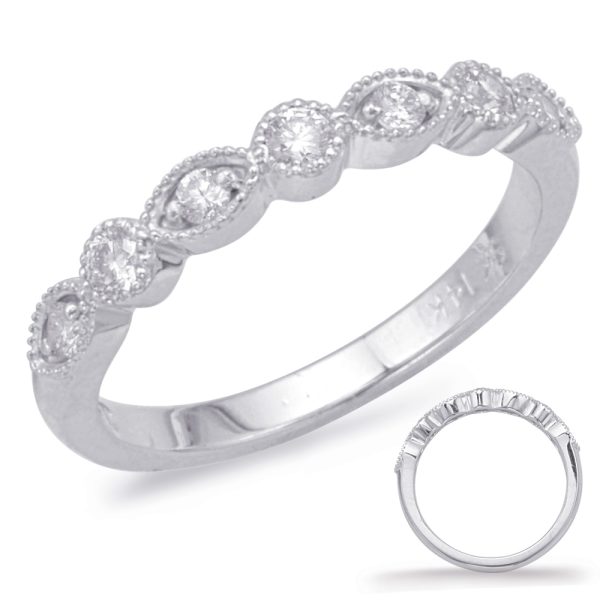 A silver ring with a design featuring multiple small round diamonds arranged in an alternating pattern.